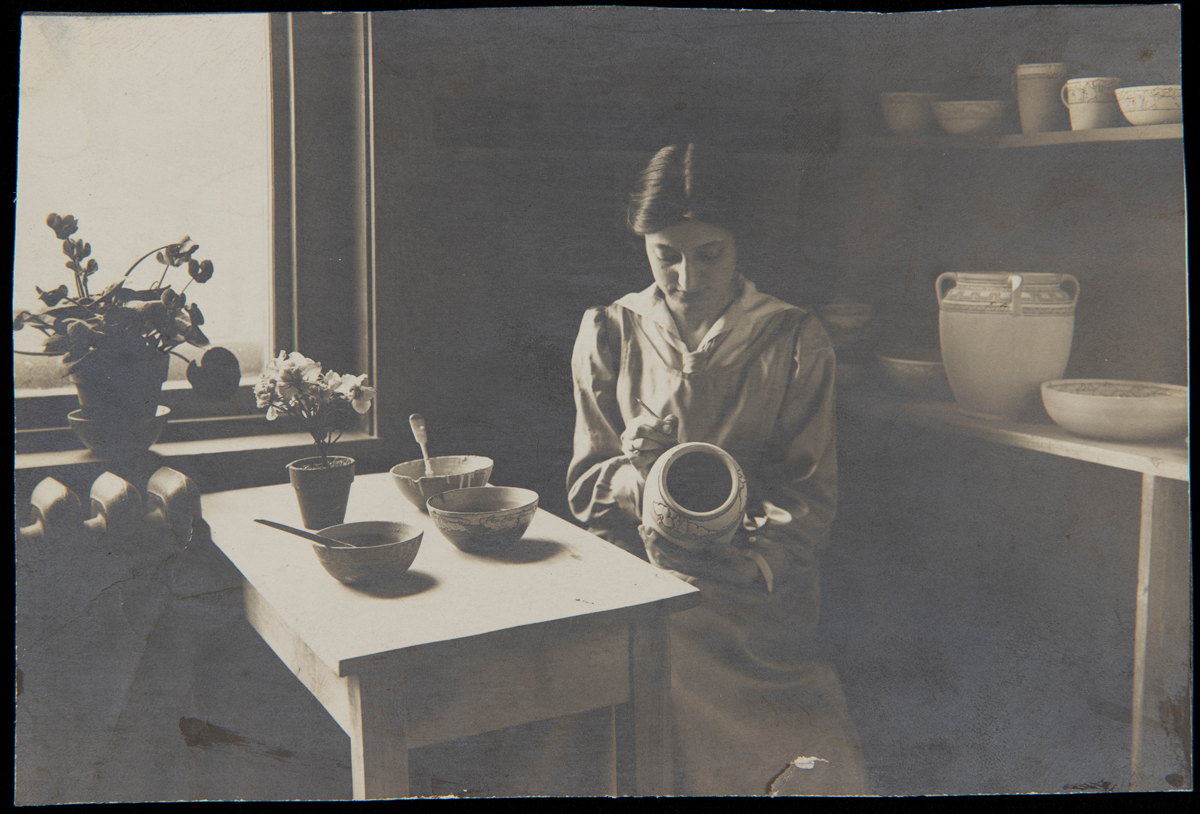 A decorator at the Paul Revere Pottery, about 1930